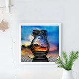 Full Diamond Painting kit - Reflection of the sunrise in a glass bottle
