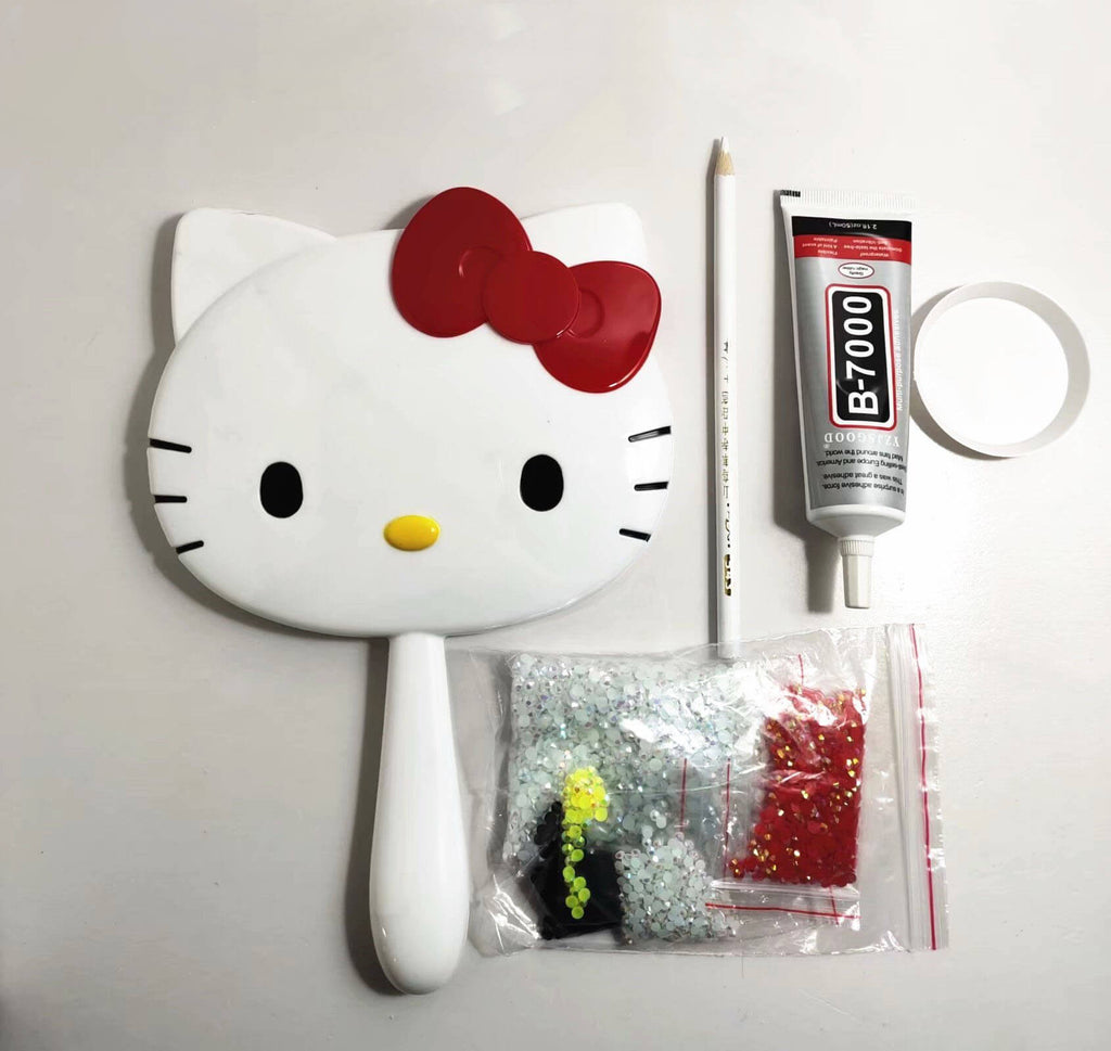 Handle Hello Kitty table mirror (with glue tools)