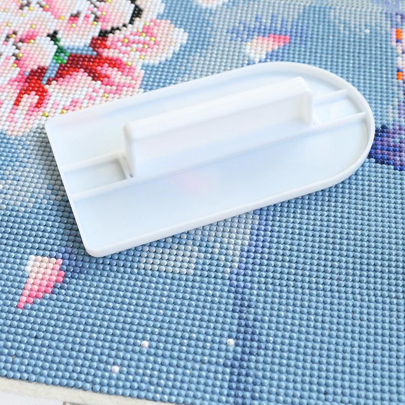 Diamond painting press holder reinforcing plate