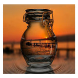 Full Diamond Painting kit - Reflection of the sunrise in a glass bottle