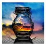 Full Diamond Painting kit - Reflection of the sunrise in a glass bottle